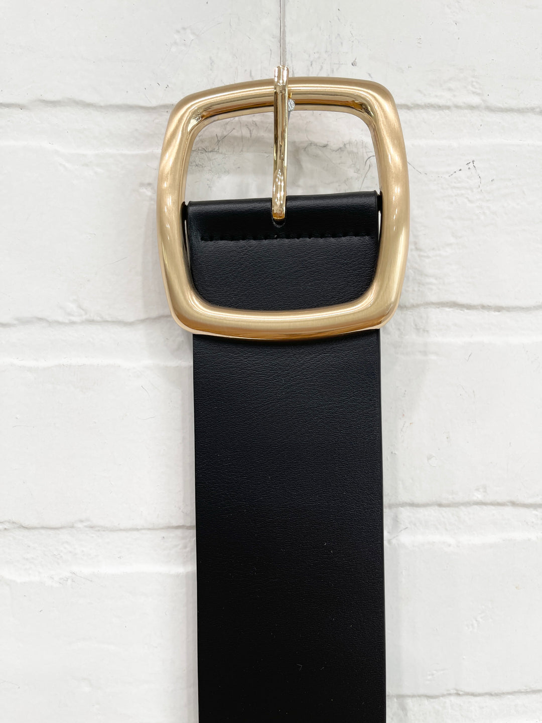Gold buckle belt