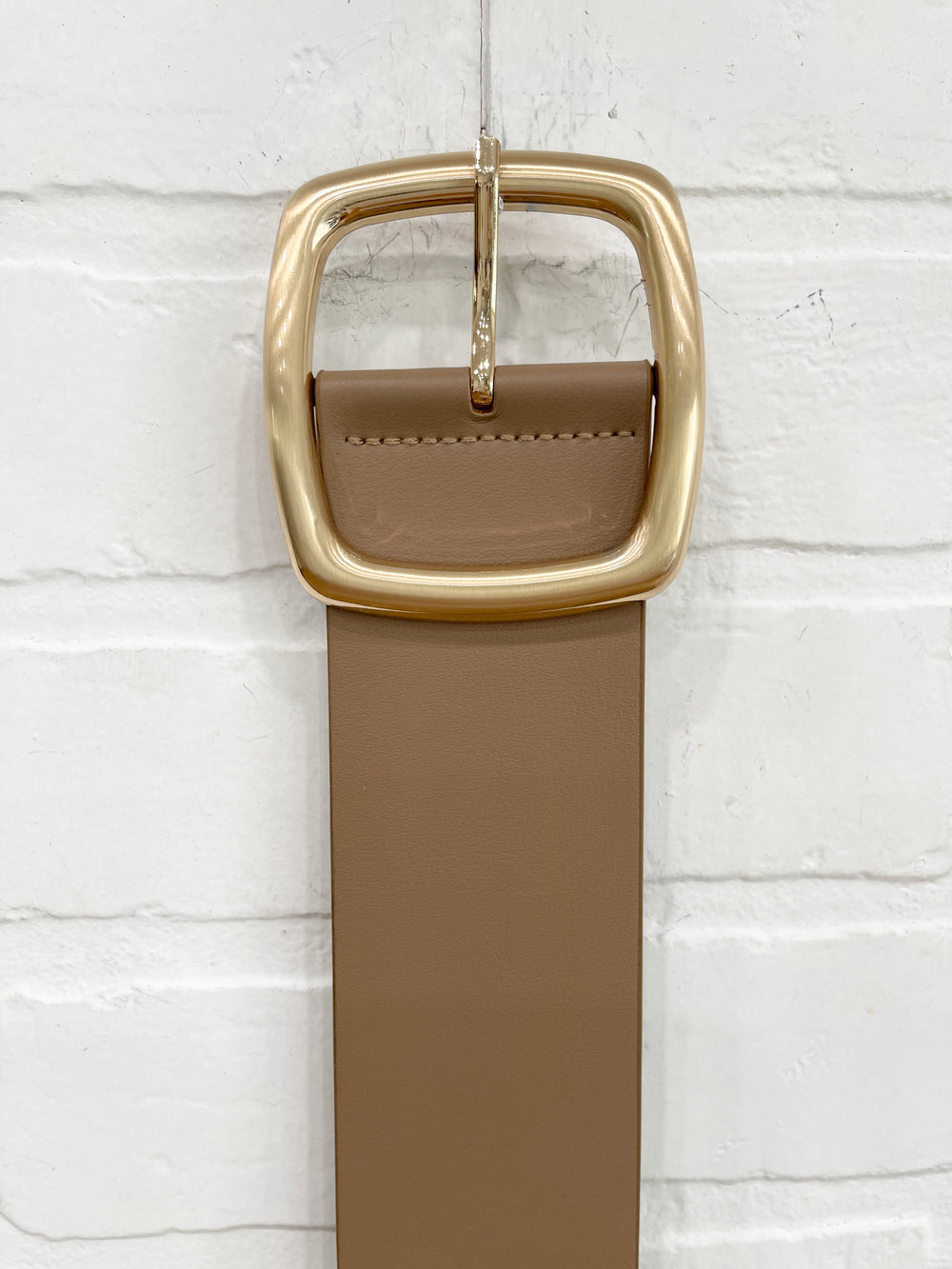 Gold buckle belt