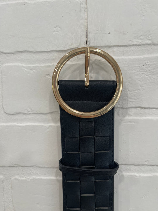 Round gold buckle belt