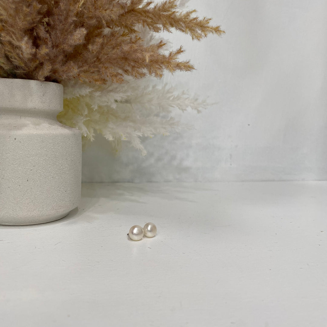 Boucle d'oreille perle blanche