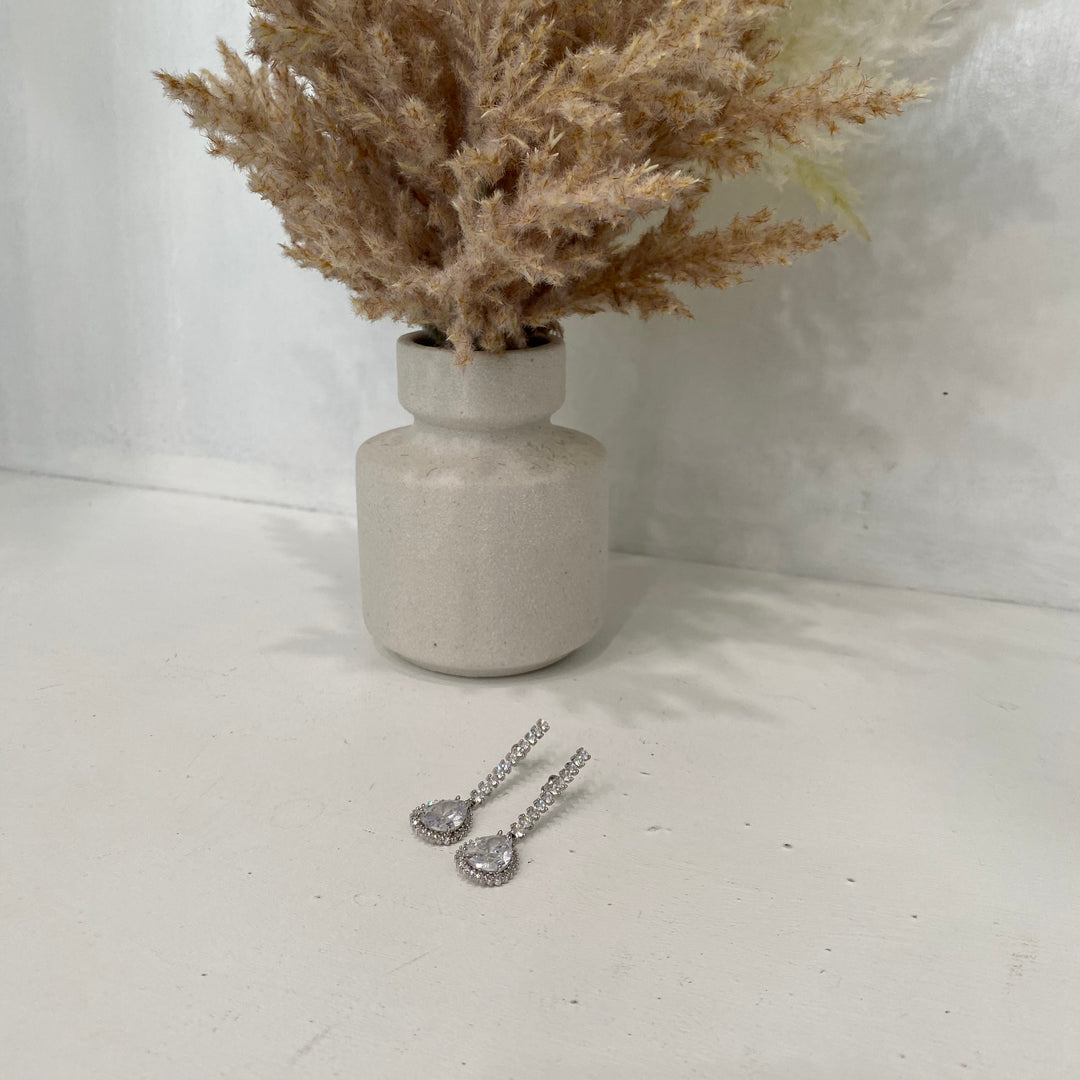 Tear Drop Crystal Hanging From A Crystal Chain