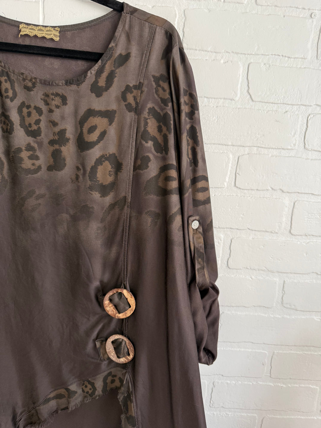Chocolate with animal print detail high /low top