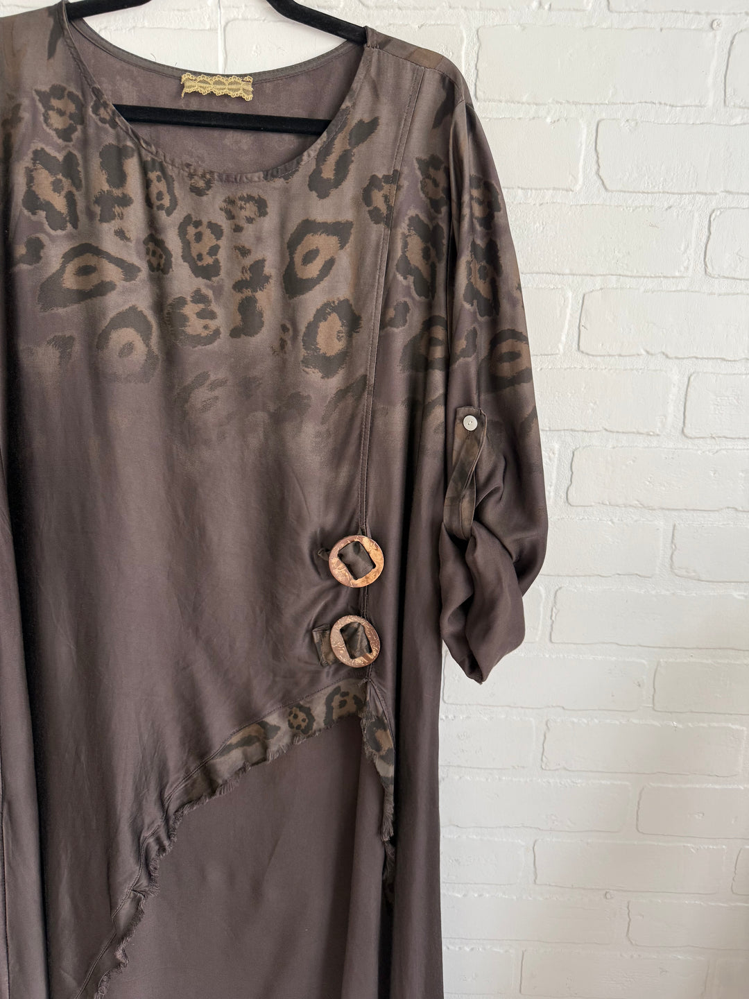 Chocolate with animal print detail high /low top