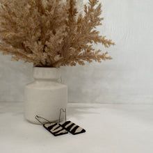 Load image into Gallery viewer, Brown And White Animal Print Earrings
