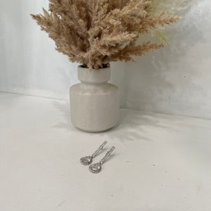 Tear Drop Crystal Hanging From A Crystal Chain