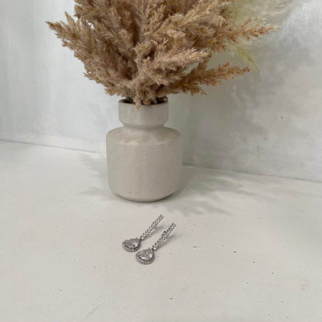 Tear Drop Crystal Hanging From A Crystal Chain